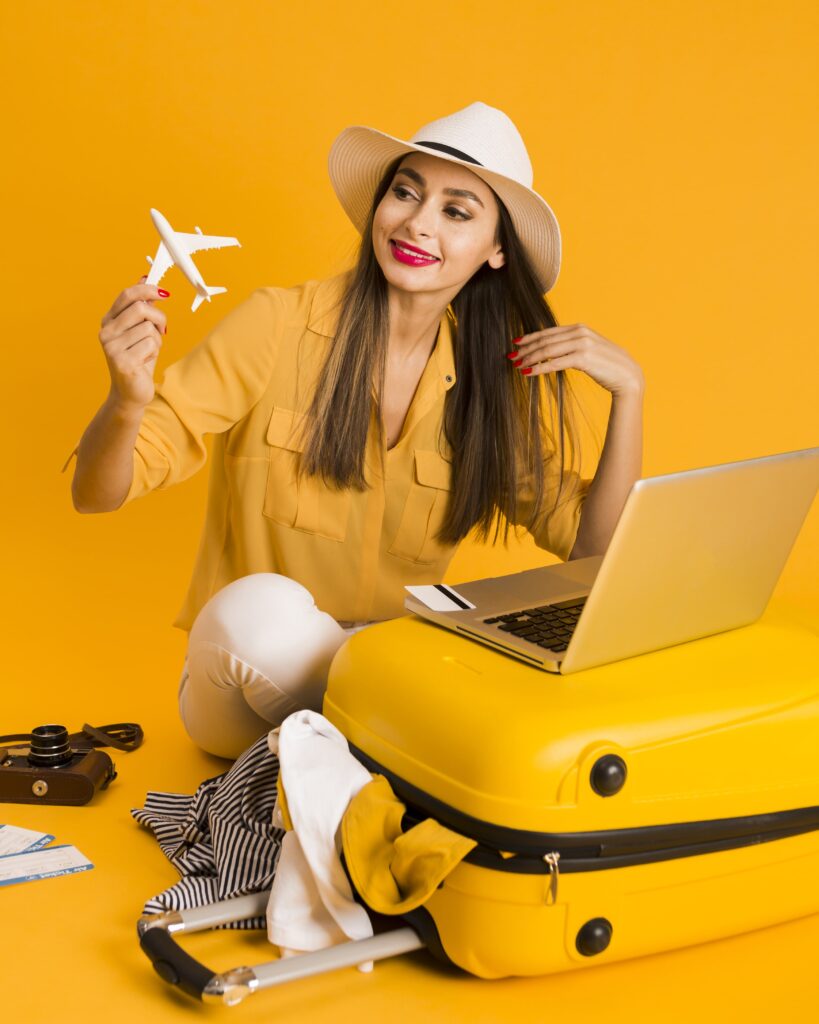smiley-woman-playing-with-plane-figurine-min